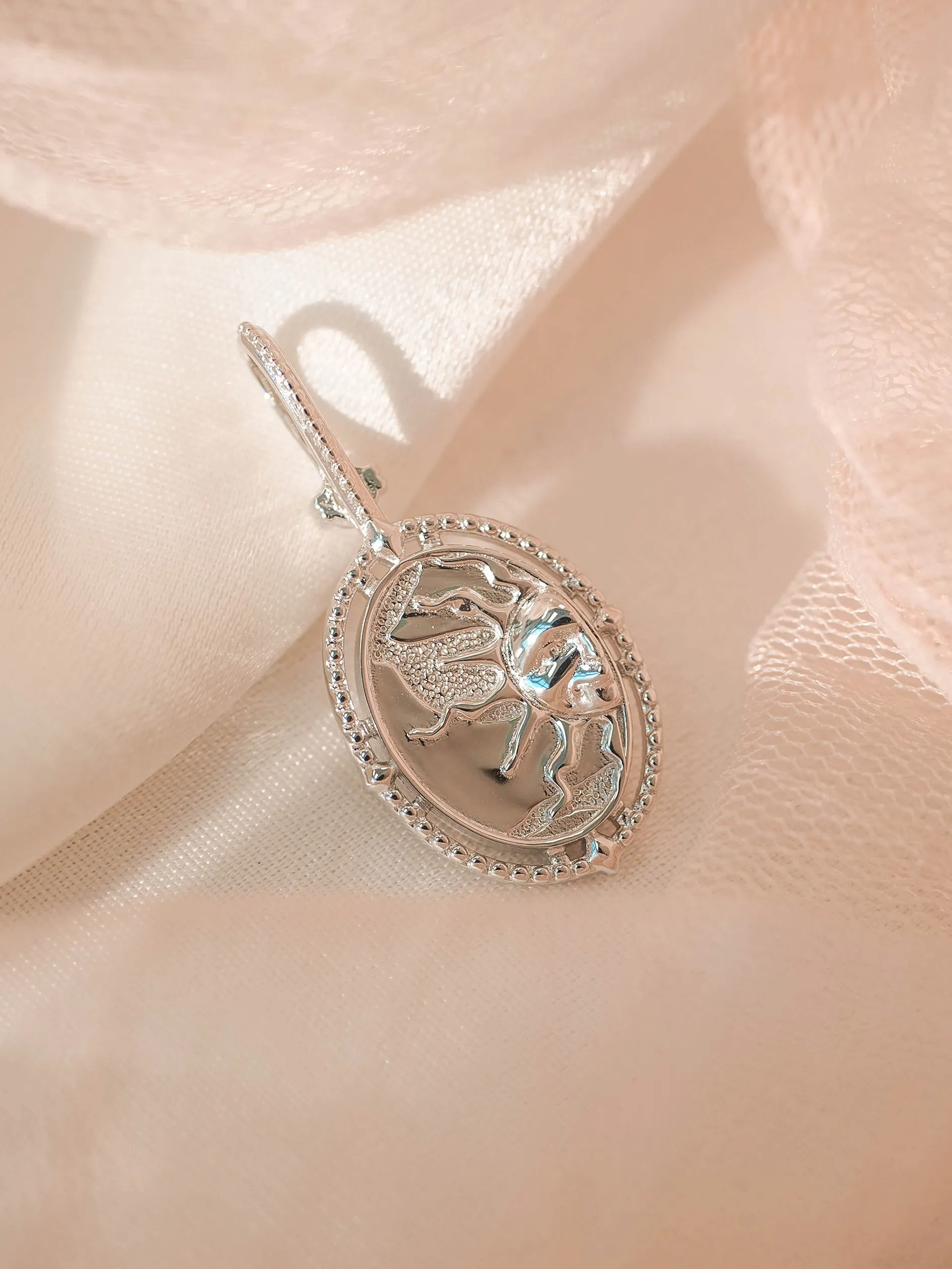 Mother of Pearl Silver Double-Sided Sun & Moon Pendant - Moon Child